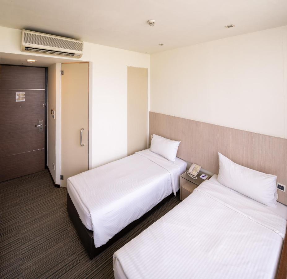 Aqueen Hotel Lavender Singapur Zimmer foto